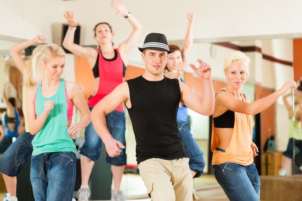 people dancing in a studio